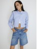 Shop Mavi's Wide Light Blue Denim Shorts for Women